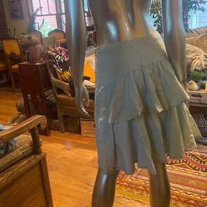 Unique Anthropologie Adillie skirt with ruffles in the back and buttons zip side